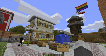 Village members frolicking at the town square, with a protest sign placed by  Badcold1337
